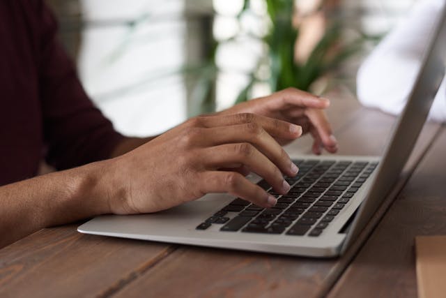 person using laptop